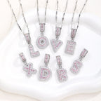 Hot-Selling Full Diamond Pink Rock Candy 26 Letter Pendant Necklace for Women Copper Inlaid Zircon Round Flower Jewelry Set 