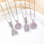 Hot-Selling Full Diamond Pink Rock Candy 26 Letter Pendant Necklace for Women Copper Inlaid Zircon Round Flower Jewelry Set 